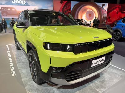 Bold front view with sleek headlights and distinctive grille design