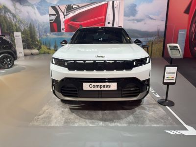 Front view of SUV with distinctive grille and modern headlights