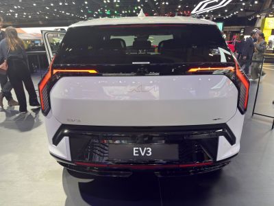Rear view with distinctive LED tail lights and hatchback design