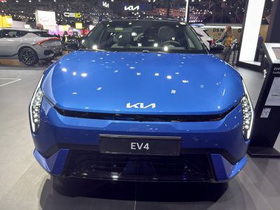 Front view of electric hatchback with distinctive LED headlights