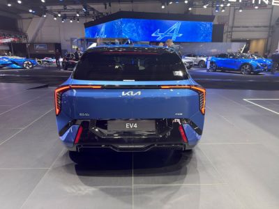 Rear view of hatchback with angular LED tail lights and GT badge