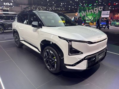 Front and side view of futuristic electric SUV with LED headlights