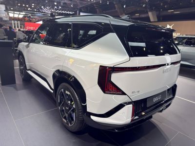 Electric SUV rear with geometric taillights and two-tone roof.