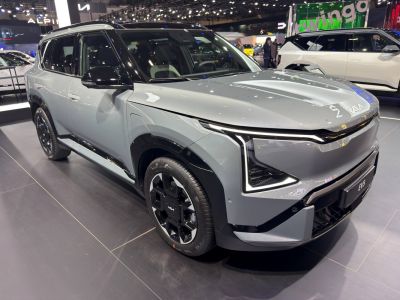 Futuristic electric SUV with sharp LED headlights and angular design