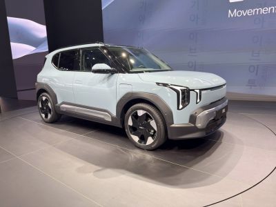 Modern electric SUV with vertical LED headlights and sleek side profile