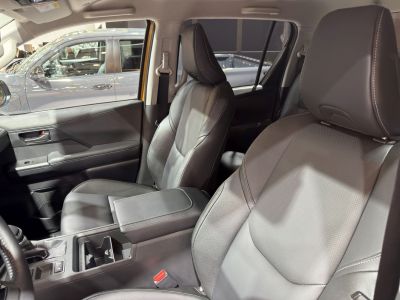 Modern leather front seats and armrest in a double cab interior