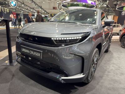 Front view with LED headlights and streamlined hood design