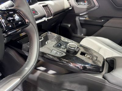 Center console with rotary gear selector and electronic parking brake