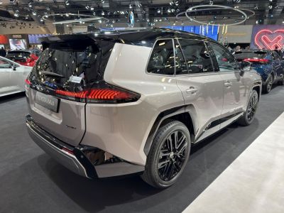 Sleek rear view with LED taillights and black alloy wheels.