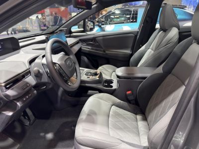 Car interior with leather seats and digital displays