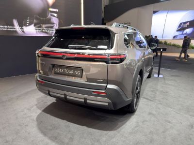 Rear view with LED tail light strip and rear bumper of an SUV