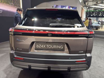 Rear view with full-width LED light bar and AWD badge