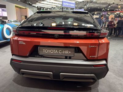 Rear view with 3EV and AWD badges, modern tail light strip, and rear bumper