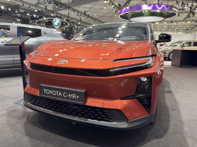 Front view with sleek LED headlights and modern grille design