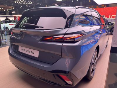 Rear view of a station wagon with sleek LED tail lights and aerodynamic shape