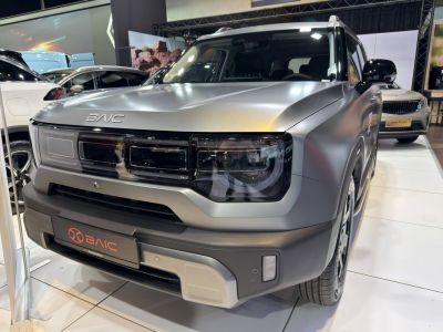 SUV front grille with modern headlight design and matte finish