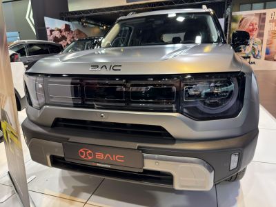 Front view with LED headlights and distinctive grille
