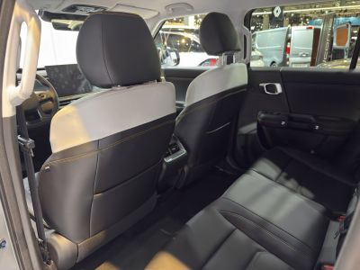 Spacious rear seats and modern two-tone upholstery with stitching.