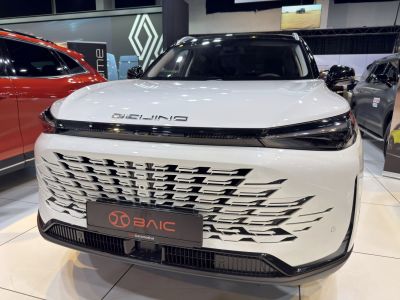 Modern front grille and sleek headlights with integrated LED strip