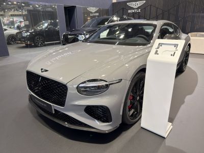 Sleek front end and black multi-spoke wheels with red brake calipers