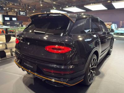 Rear view of luxury SUV with distinctive taillights and sporty detailing