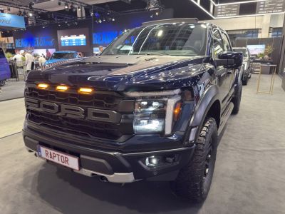 Front grille, LED headlights, amber marker lights of a rugged pickup