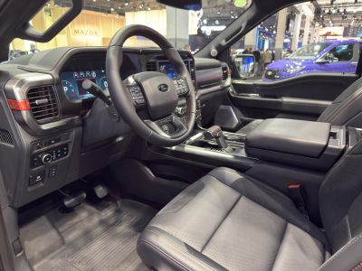 Modern pickup interior with digital dashboard and multifunction steering