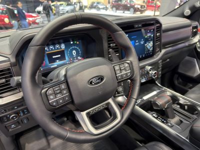 Modern digital dashboard and steering wheel with advanced controls