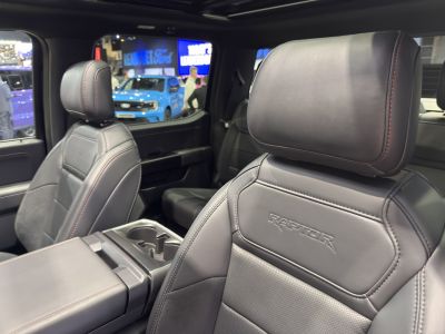 Premium leather seats with embossed RAPTOR branding in a pickup interior