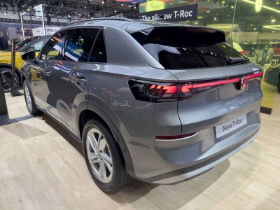Rear and side view of compact SUV with LED tail lights and tinted windows