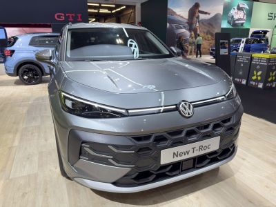 Front view with sleek LED headlights and hexagonal grille