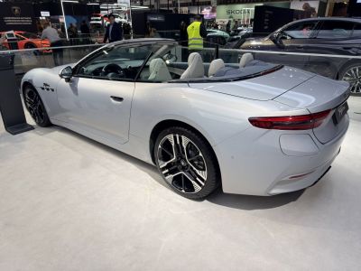 Sleek convertible with modern alloy wheels and smooth rear design