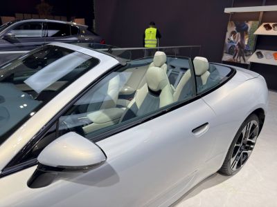 Convertible with premium white leather seats and sleek side profile