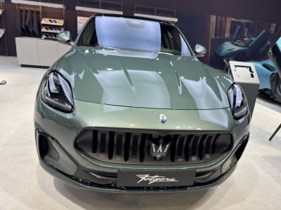 Front view of 2022 SUV with sleek headlights and bold grille