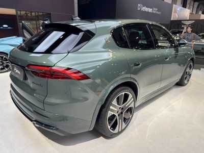 Sleek rear and side view with sharp taillights and stylish alloy wheels