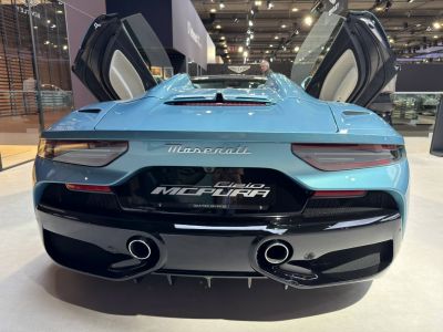 Rear view with dual exhausts and butterfly doors open