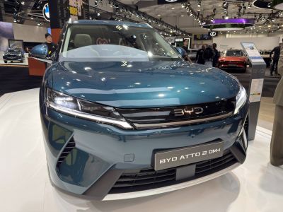 Close-up of modern front fascia with LED headlights and grille