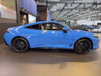 Blue coupe with aerodynamic body and black alloy wheels