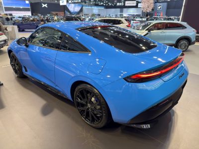 Rear and side profile with sleek tail light and black wheels