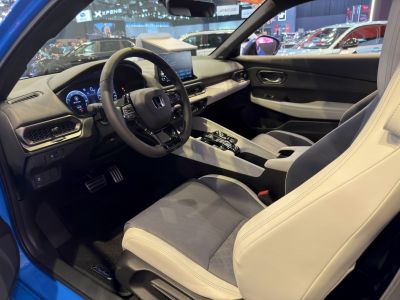 Digital instrument cluster and central touchscreen in modern car interior