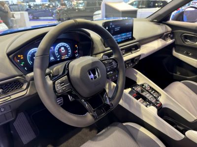 Digital dashboard with touchscreen infotainment and multifunction steering wheel