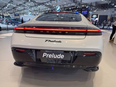 Rear view showcasing continuous LED taillight and 'Prelude' badge.