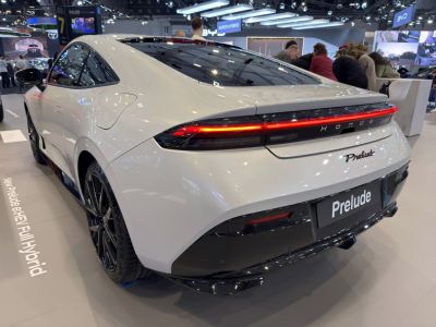 Sleek rear with a continuous LED light bar and black diffuser.