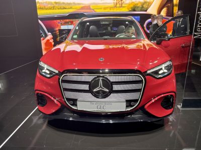 Front view with LED headlights and distinctive grille design