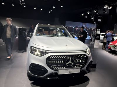 Electric SUV front with signature grille and LED headlights