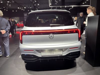 Rear view with LED tail light bar and sleek modern crown emblem