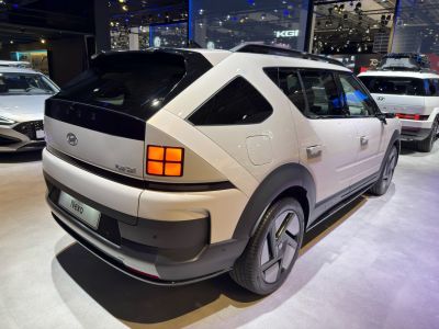 Futuristic rear and side view with distinctive taillights and aerodynamic design