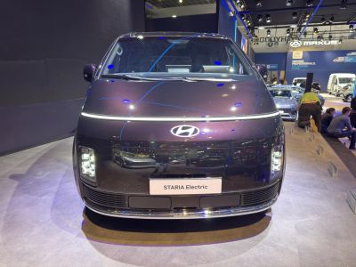 Futuristic front view with dual-level LED headlights and sleek modern design