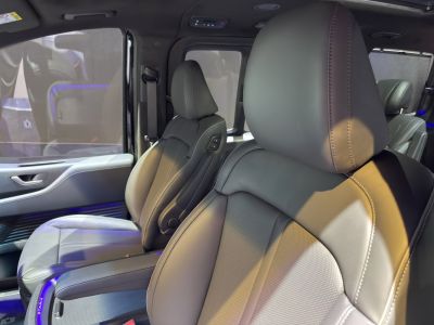 Premium leather seats with modern ambient lighting in SUV van interior