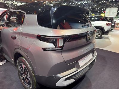 Rear view showing LED taillights and sleek rear window design.